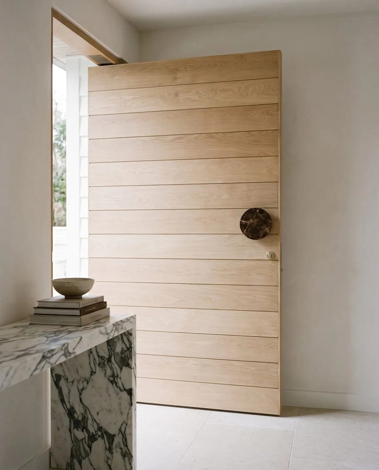Entry Pull in Emperador, installed