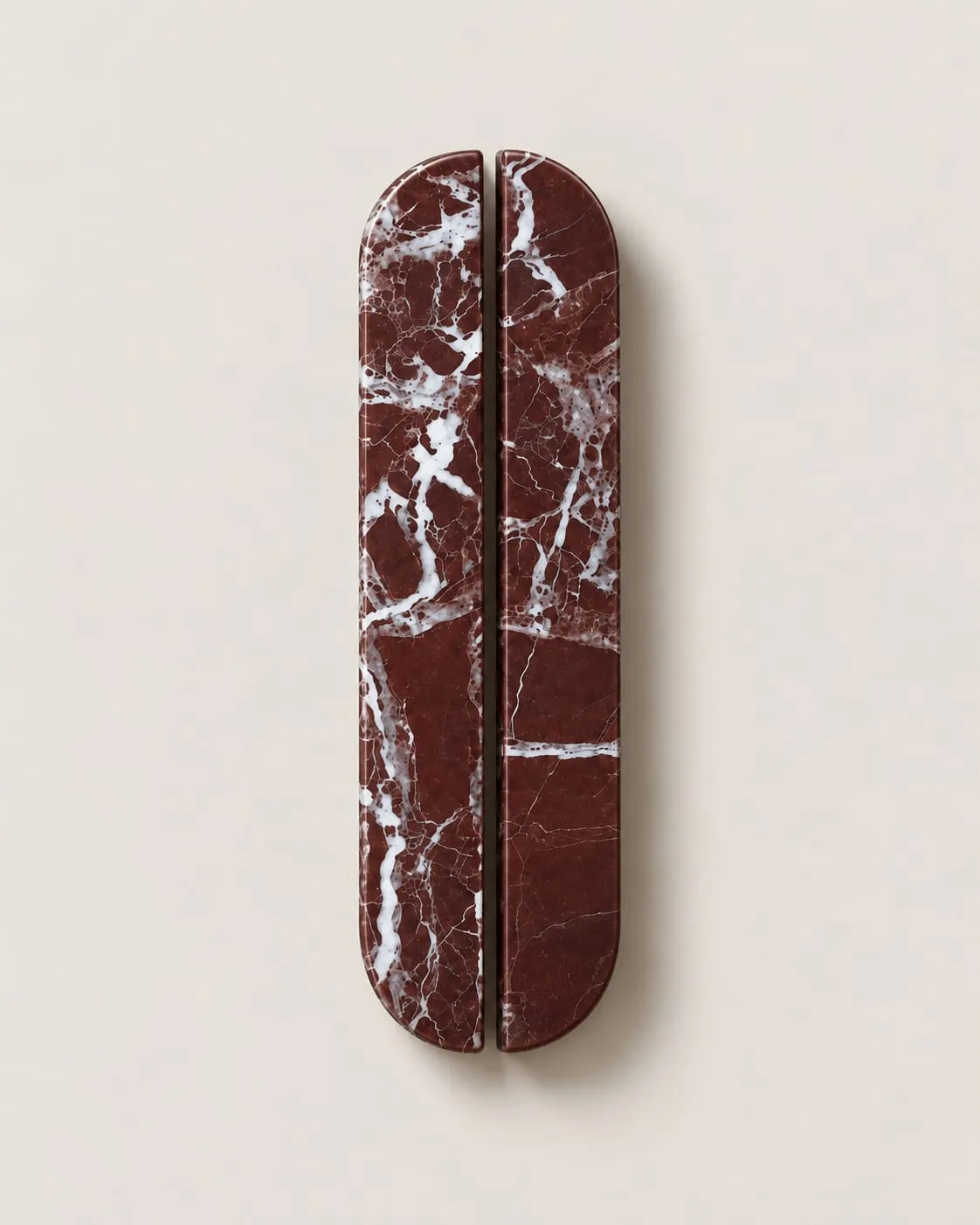 Oval Pull in Rosso Levanto, honed, 320 mm, on a plain background