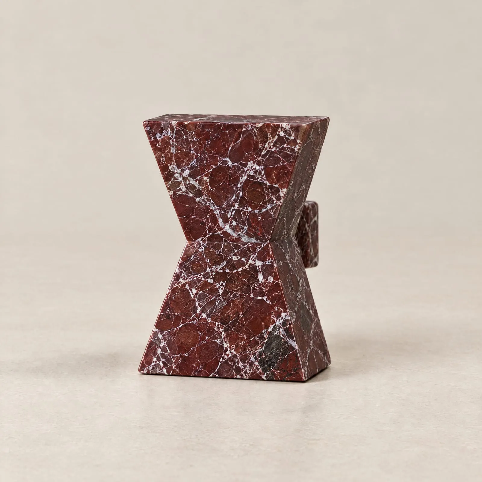 Bow Knob in Rosso Levanto, on a plain background